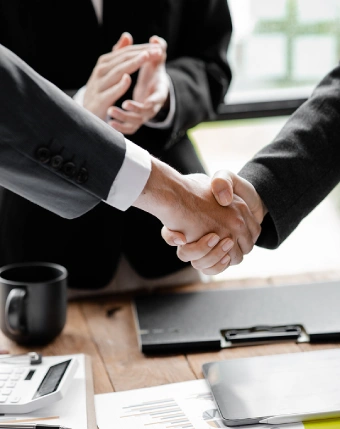 closeup-two-business-men-holding-hands-two-businessmen-are-agreeing-business-together-shaking-hands-after-successful-negotiation-handshaking-is-western-greeting-congratulation-1 closeup-two-business-men-holding-hands-two-businessmen-are-agreeing-business-together-shaking-hands-after-successful-negotiation-handshaking-is-western-greeting-congratulation-1